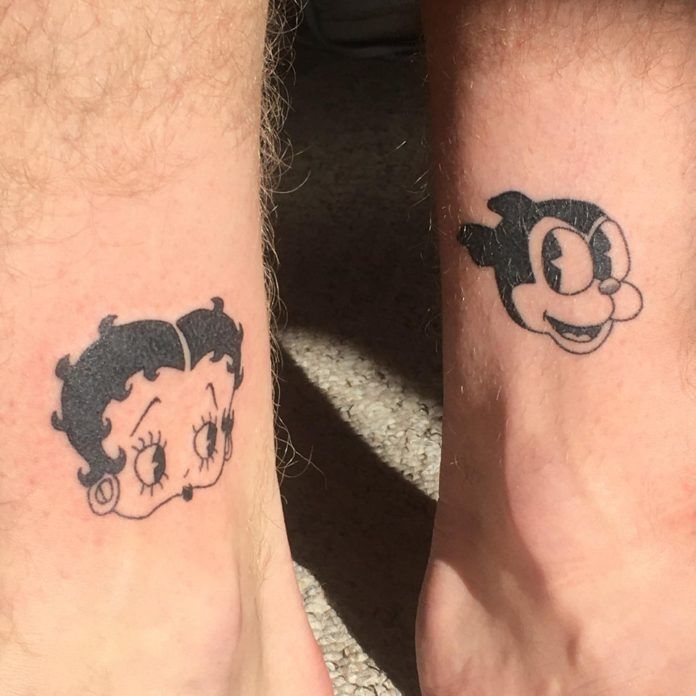 Many hand poke tattoo artist avoid large areas of black ink but this brave tattooer chose Betty Boop and Bimbo who both have significant areas of black ink in their character designs